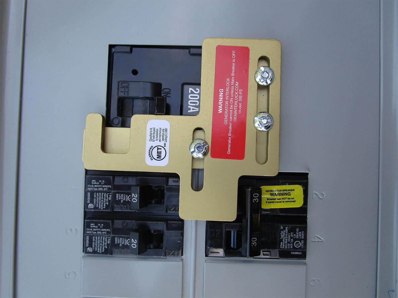 Generator interlock kit installed on breaker panel