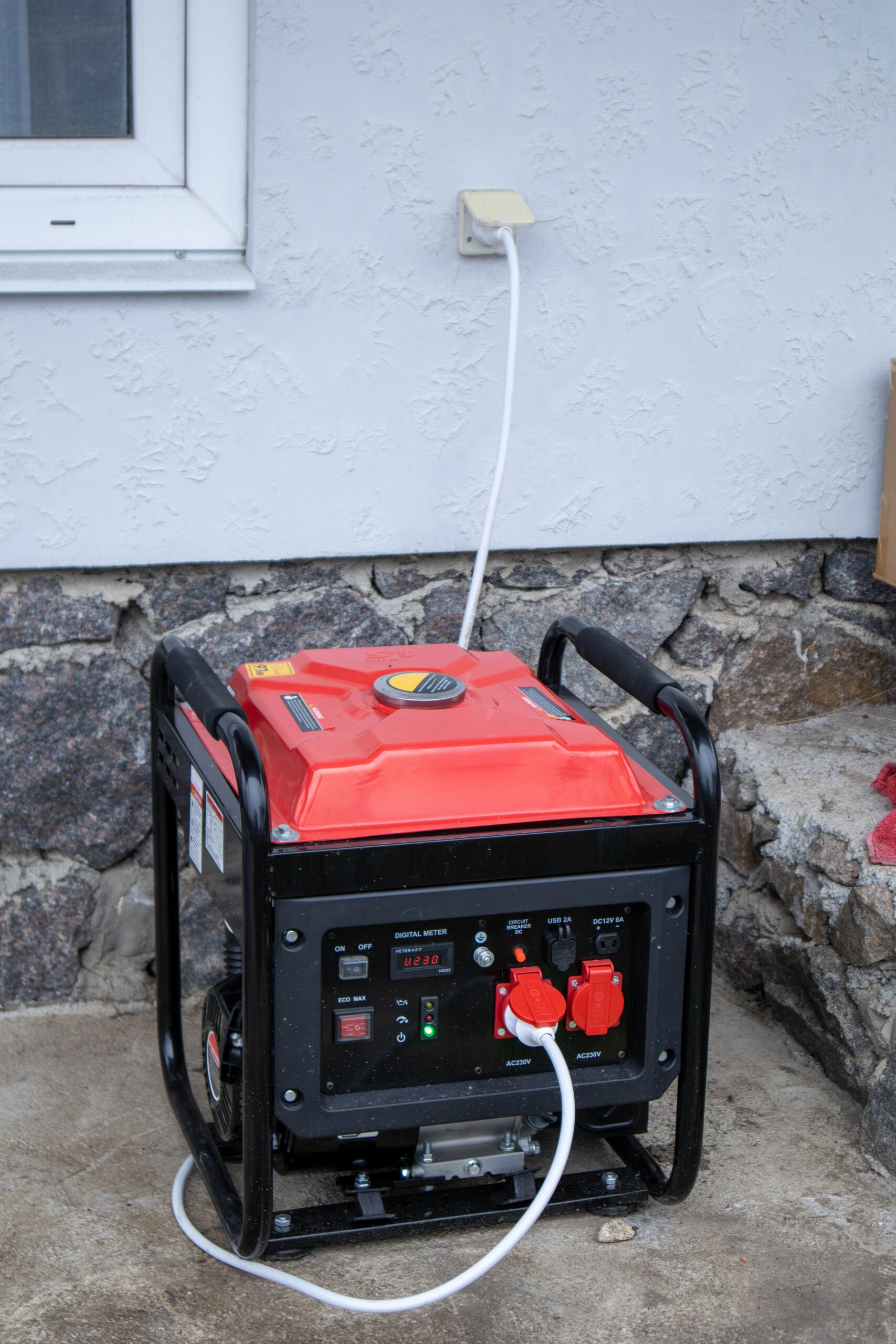 Portable generator powering a house during an outage