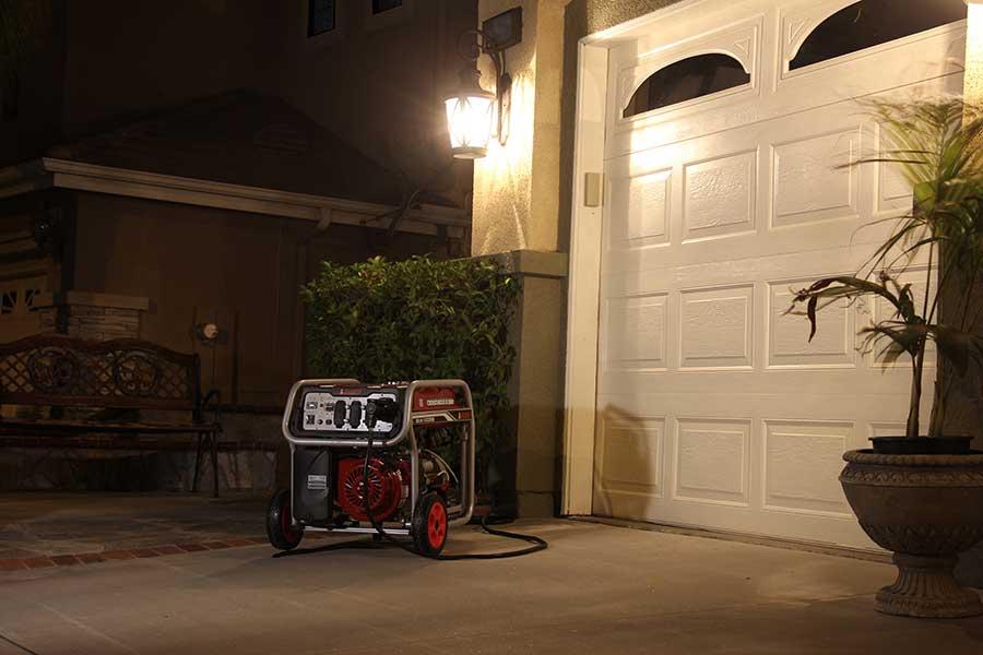 Portable generator outside house for temporary outage setup