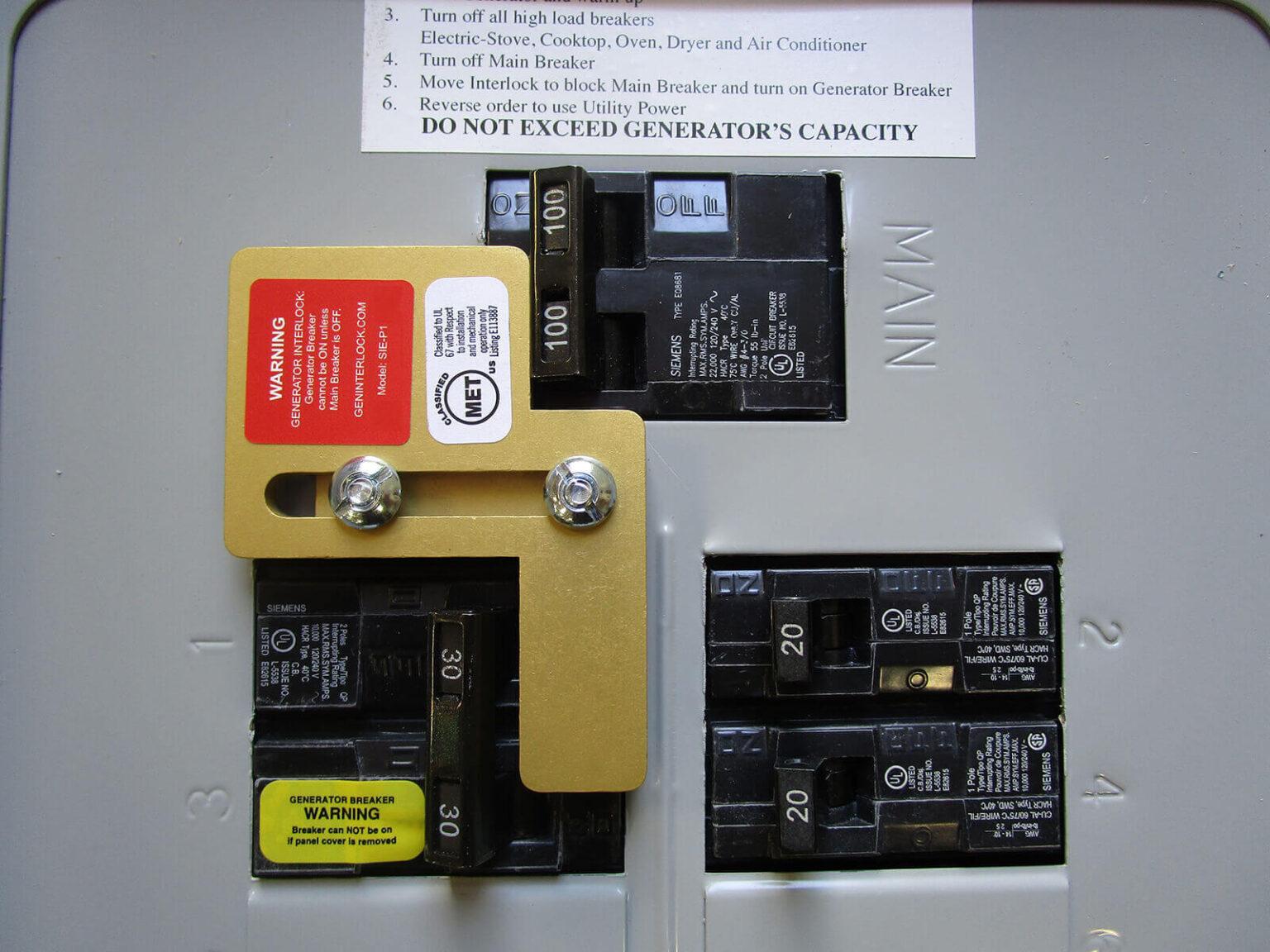 Electrician inspecting a residential breaker panel for generator interlock compatibility