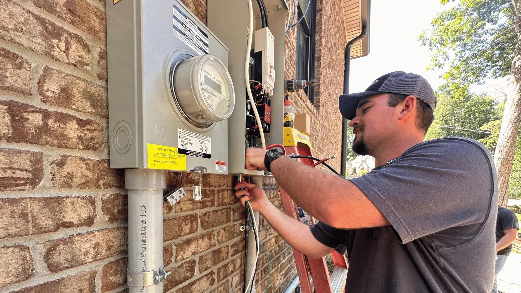 Generator transfer switch connected to an electrical panel